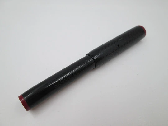Eversmooth. Black hard rubber and red ends. 14 karat gold nib. Lever filler system. 1920's