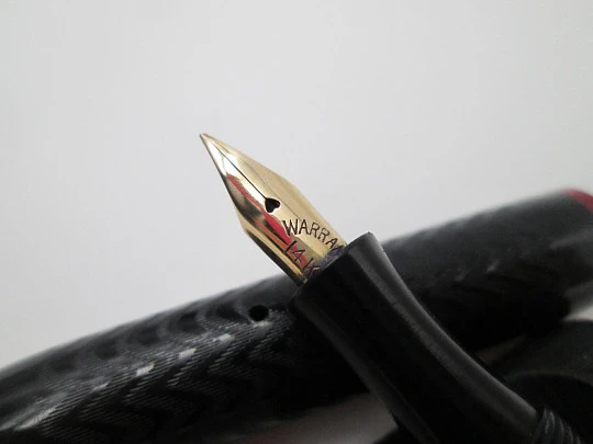 Eversmooth. Black hard rubber and red ends. 14 karat gold nib. Lever filler system. 1920's