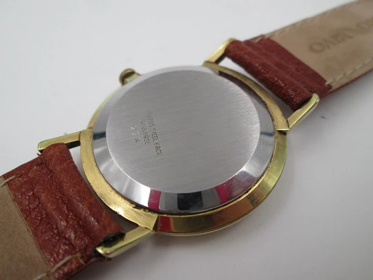 EverSwiss. Stainless steel & gold plated. Manual wind. Leather strap. 1960's