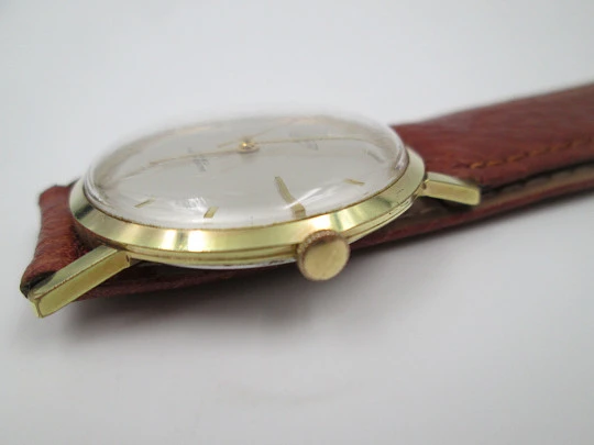 EverSwiss. Stainless steel & gold plated. Manual wind. Leather strap. 1960's