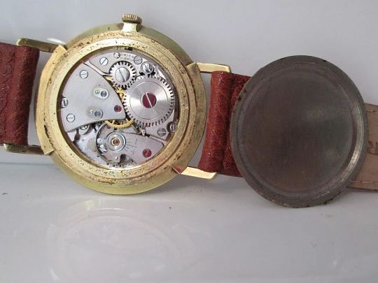 EverSwiss. Stainless steel & gold plated. Manual wind. Leather strap. 1960's