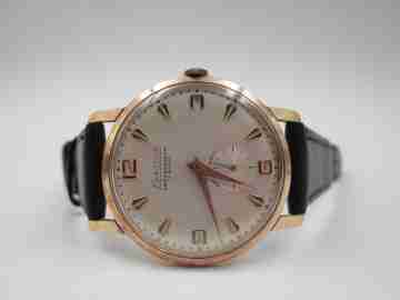 Exactus Ambassadeur. Acero y chapado oro. Cuerda manual. Segundero. 1950