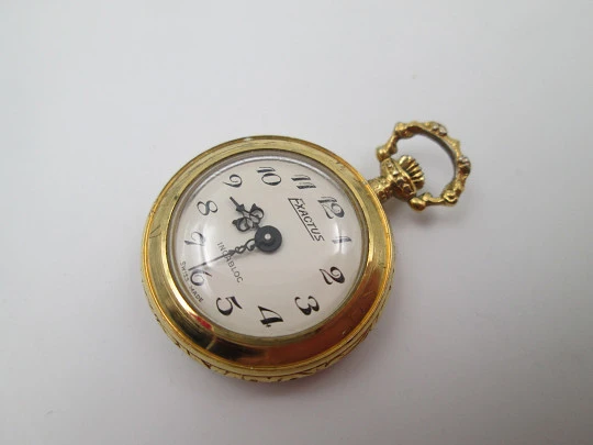 Exactus pendant watch. Gold plated metal. Manual wind. Horses enamel on back. 1960's