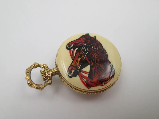 Exactus pendant watch. Gold plated metal. Manual wind. Horses enamel on back. 1960's