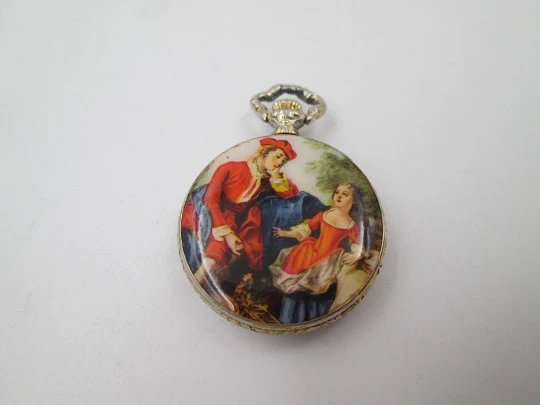 Exactus pendant watch. Gold plated. Manual wind. Romantic scene enamel on back. 1970's Exactus pendant watch. Gold plated. Manual wind. Romantic scene enamel on back. 1970's