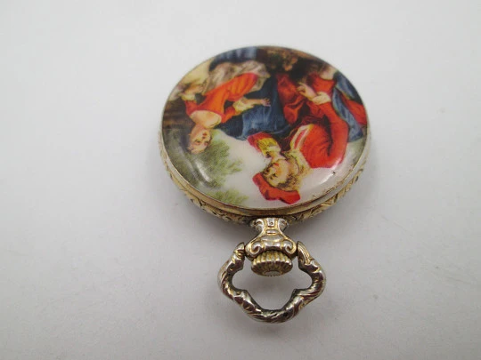 Exactus pendant watch. Gold plated. Manual wind. Romantic scene enamel on back. 1970's Exactus pendant watch. Gold plated. Manual wind. Romantic scene enamel on back. 1970's