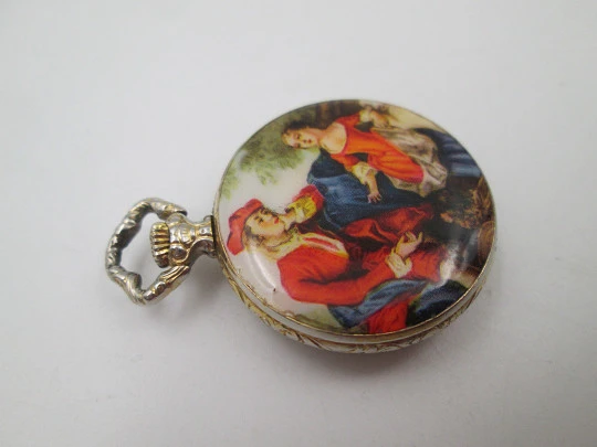 Exactus pendant watch. Gold plated. Manual wind. Romantic scene enamel on back. 1970's Exactus pendant watch. Gold plated. Manual wind. Romantic scene enamel on back. 1970's