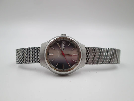 Exactus. Acero inoxidable. Automático. Calendario. Brazalete. Suiza. 1970