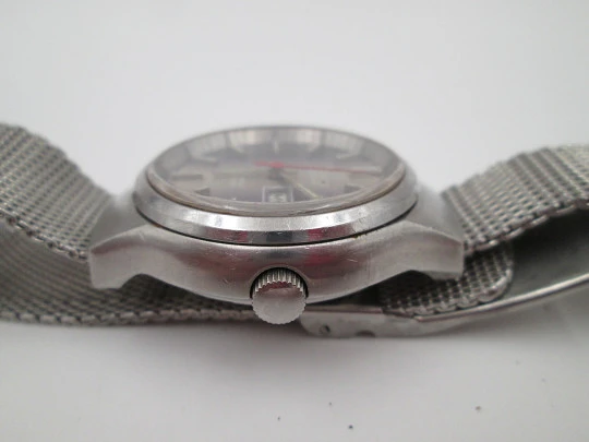 Exactus. Acero inoxidable. Automático. Calendario. Brazalete. Suiza. 1970