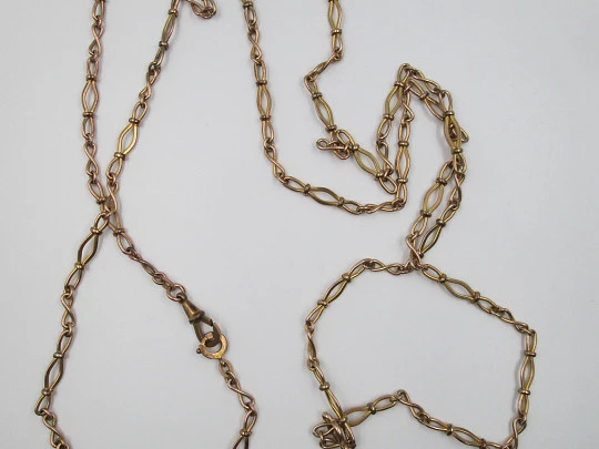 Fan chain. Gold plated. Braided links and openwork pendant. 1940's. Europe