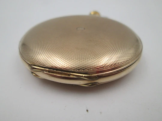 Favor hunter-case pocket watch. Gold plated metal. Stem-wind. Porcelain dial. 1920's