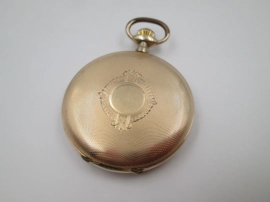 Favor hunter-case pocket watch. Gold plated metal. Stem-wind. Porcelain dial. 1920's