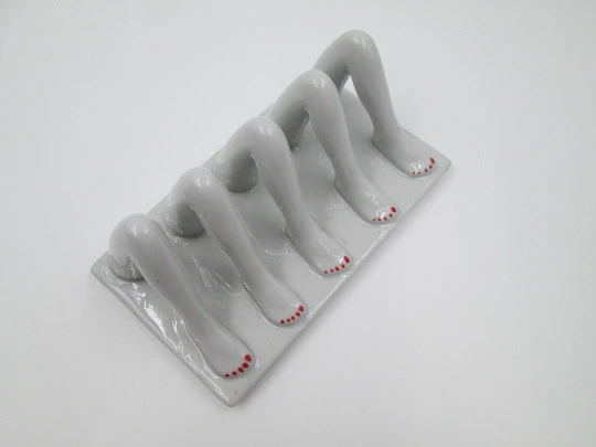 Female legs letter stand / holder. White and red ceramic. 1960's Female legs letter stand / holder. White and red ceramic. 1960's