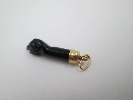 Figa / higa pendant. Black hand. 18 karat gold and yet. Amulet. Spain