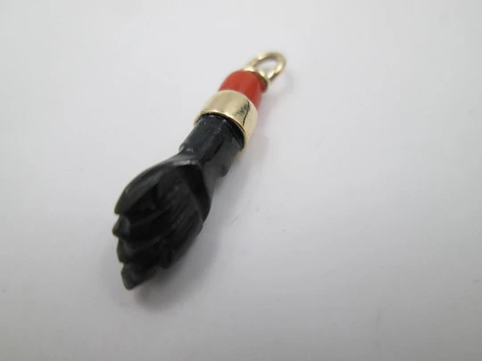 Figa / higa pendant. Black hand. 18 karat gold. Coral sphere & jet. Amulet. 1950's