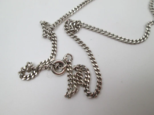 Figurative baby rattle with chain. Sterling silver. Squirrel shape. Pedro Durán. 1990's