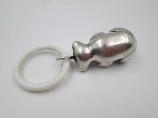 Figurative baby rattle. 925 sterling silver. Bear shape. White resin ring. Spain. 1980's