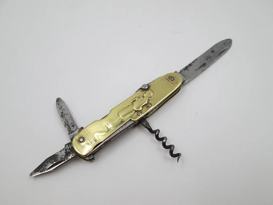 Figurative pocket knife. Brass and steel. Embossed bagpiper and woman. 1930's