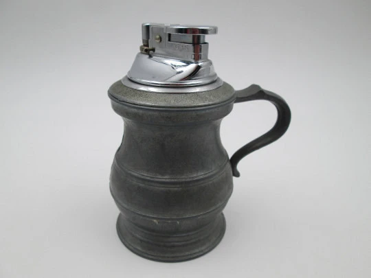 Figurative table gas lighter. Round jug. Pewter and silver plated metal. Europe. 1960's