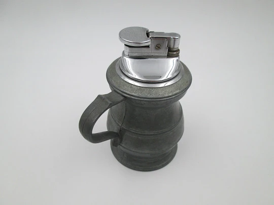 Figurative table gas lighter. Round jug. Pewter and silver plated metal. Europe. 1960's
