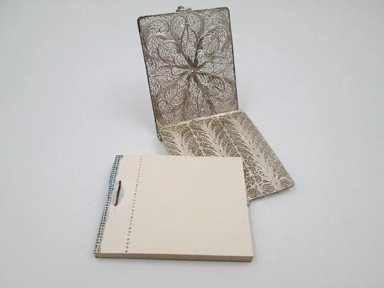 Filigree notebook. Sterling silver. 1970's. Vegetable motifs. Tab clasp