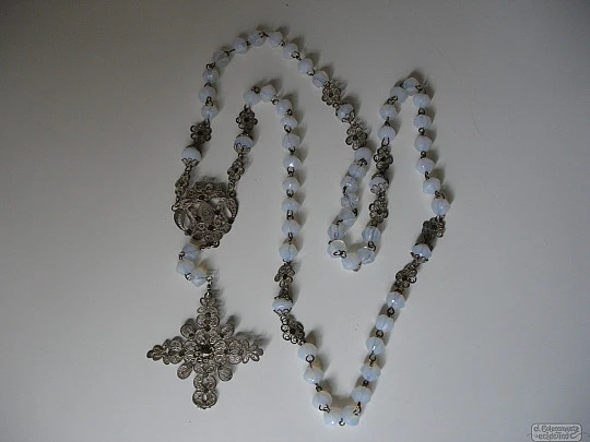 Filigree rosary. Silver-plated and white crystal. Faceted beads