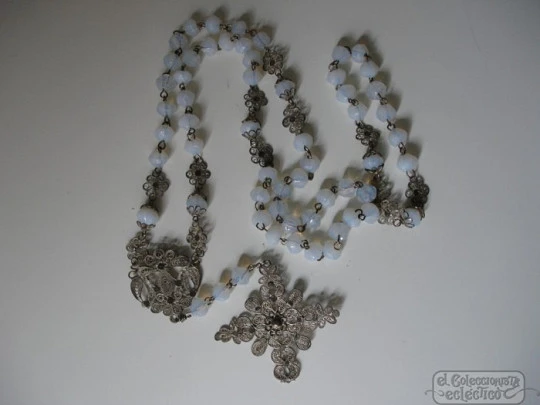 Filigree rosary. Silver-plated and white crystal. Faceted beads