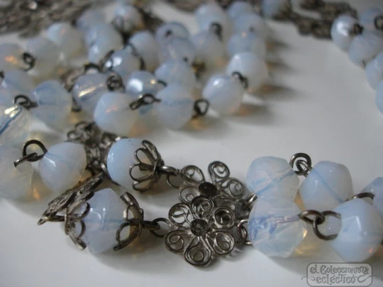 Filigree rosary. Silver-plated and white crystal. Faceted beads