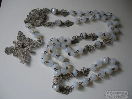 Filigree rosary. Silver-plated and white crystal. Faceted beads