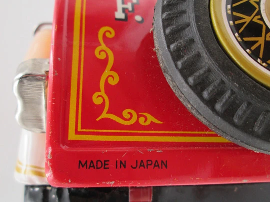 Fire truck toy. Lithographed tinplate. Battery operated. Nomura / Showa (Japan). 1950's