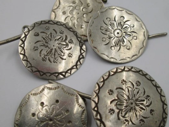 Five regional costumes buttons. Silver. Floral motifs. Handmade. 1940's