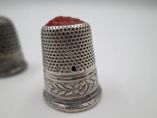 Five sewing thimbles. Sterling silver. Hammer texture & ornate motifs