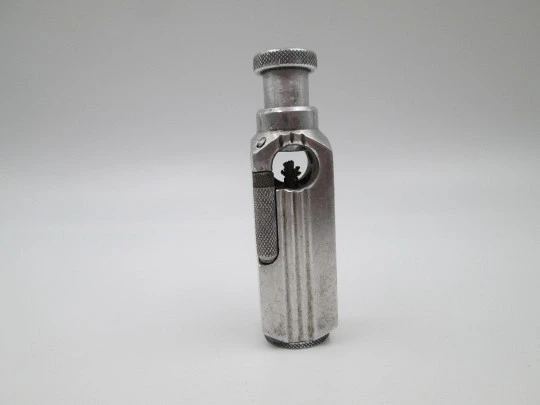 Flamidor Flambeau pocket petrol pipe lighter. Aluminum. Ribbed pattern. France. 1948