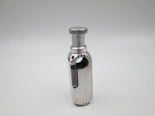 Flamidor Flambeau pocket petrol pipe lighter. Aluminum. Ribbed pattern. France. 1948