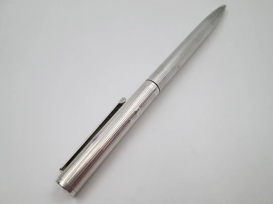 Flaminaire ballpoint pen. Rolled silver. Vertical lines pattern. Twist system. 1970's. Germany