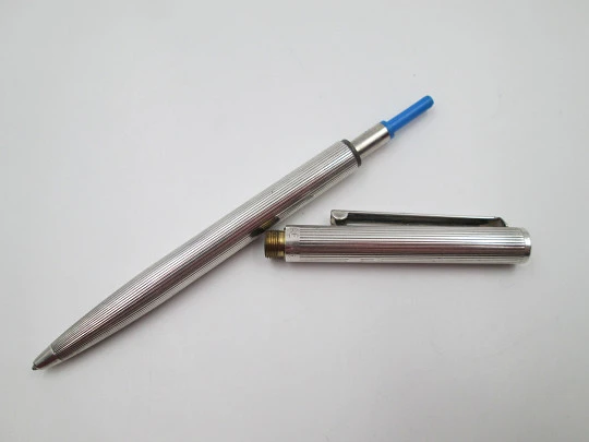 Flaminaire ballpoint pen. Rolled silver. Vertical lines pattern. Twist system. 1970's. Germany
