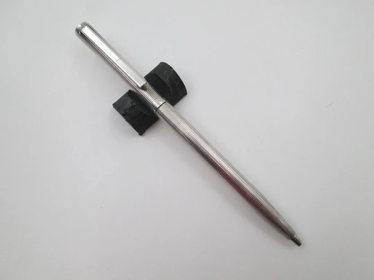 Flaminaire ballpoint pen. Rolled silver. Vertical lines pattern. Twist system. 1970's. Germany