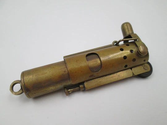 Flint wheel & wick cylindrical cigarette lighter. Gold plated. Sliding body. Petrol