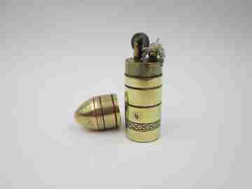 Flint wheel & wick cylindrical petrol cigarette lighter. Gold plated. Floral motifs. 1960's