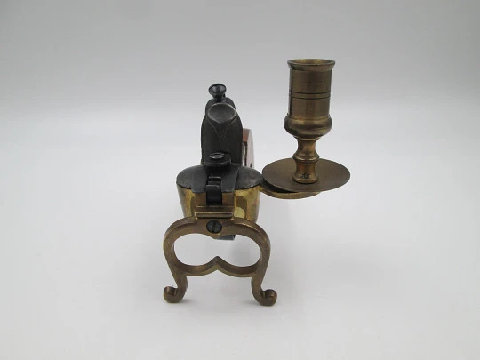 Flintlock tinder pistol lighter with candle holder. Iron and brass. Wooden handle. Italy