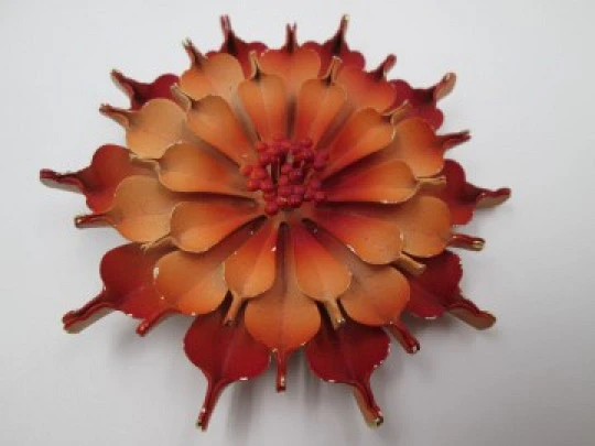 Flower brooch. Golden metal and red enamel. Circa 1960's. Europe