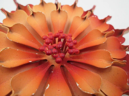 Flower brooch. Golden metal and red enamel. Circa 1960's. Europe