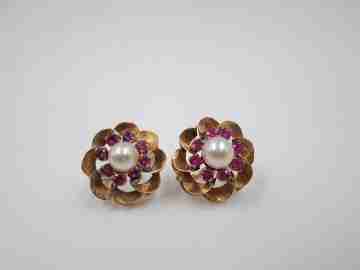 Flower earrings. 18 karat yellow gold, rubies and pearl. Circa 2000