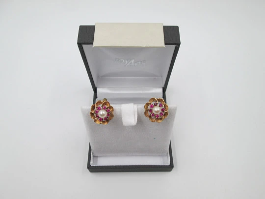 Flower earrings. 18 karat yellow gold, rubies and pearl. Circa 2000