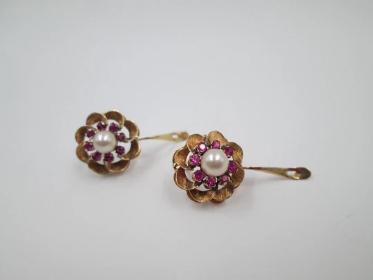 Flower earrings. 18 karat yellow gold, rubies and pearl. Circa 2000