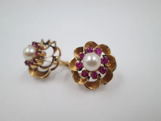 Flower earrings. 18 karat yellow gold, rubies and pearl. Circa 2000