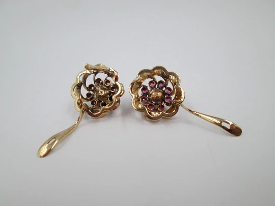 Flower earrings. 18 karat yellow gold, rubies and pearl. Circa 2000
