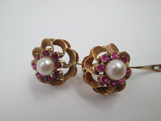 Flower earrings. 18 karat yellow gold, rubies and pearl. Circa 2000