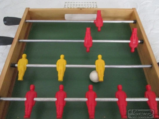 Folding foosball table. Wood, metal and plastic. 1970's. Spain