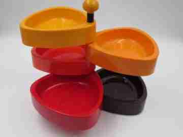 Food centerpiece. Rotating trays and support. Colored plastic. 1960's